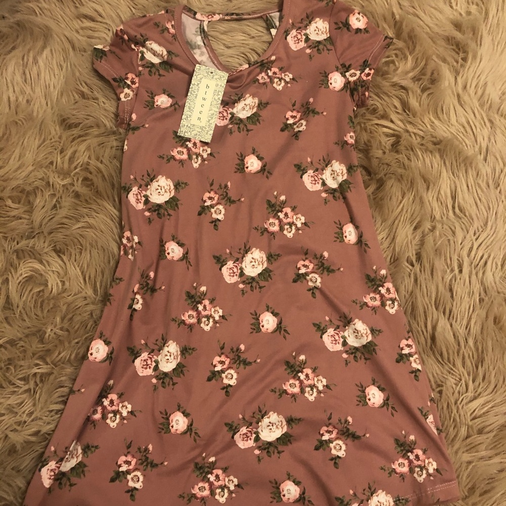 between pink floral dress